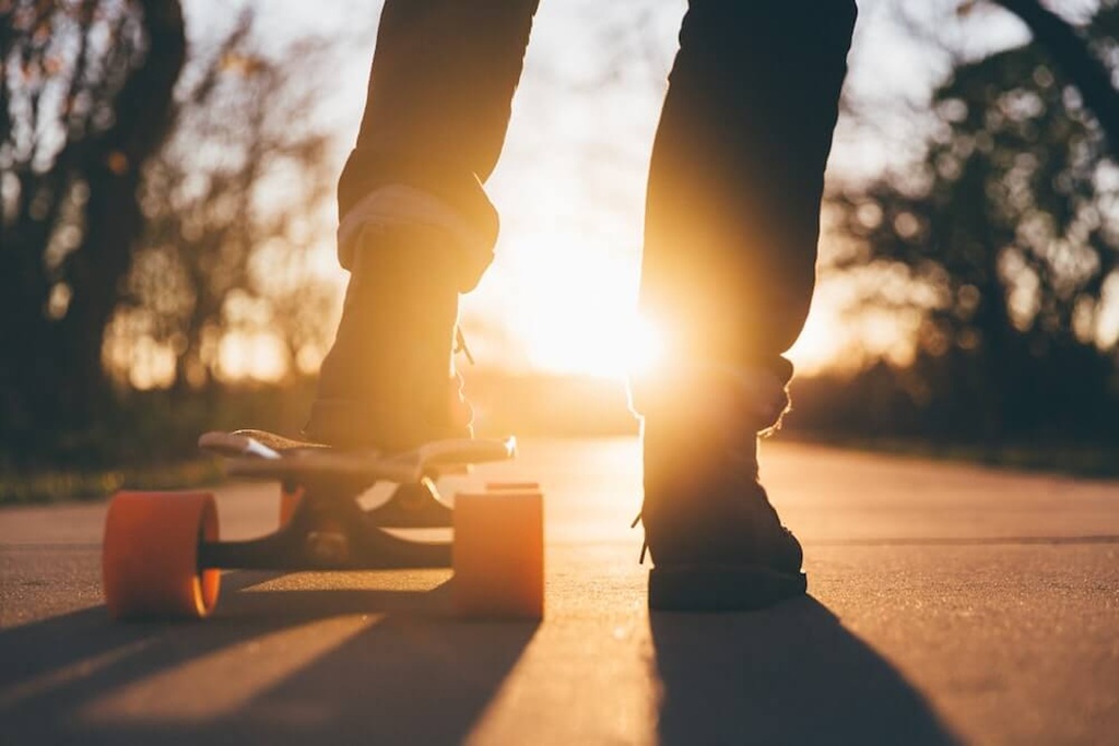 What is the best way to stop on a skateboard?